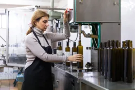 Olive oil producer bottling olive oil
