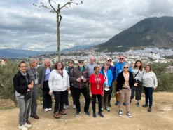 Group smiling in front of Rif Mountains