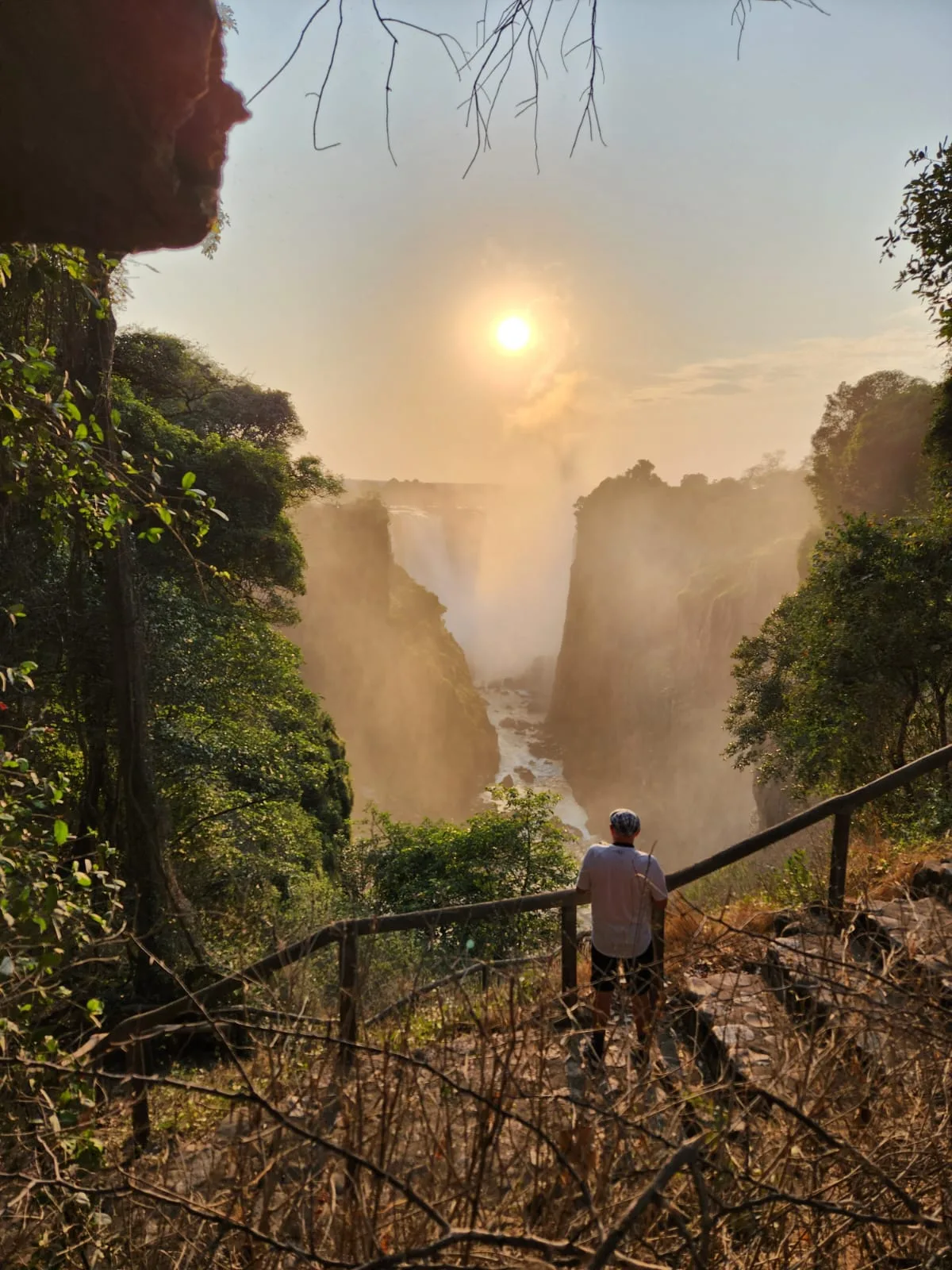 Traveller in front of Victoria Falls day 18, South Africa & Victoria Falls Approach Tour