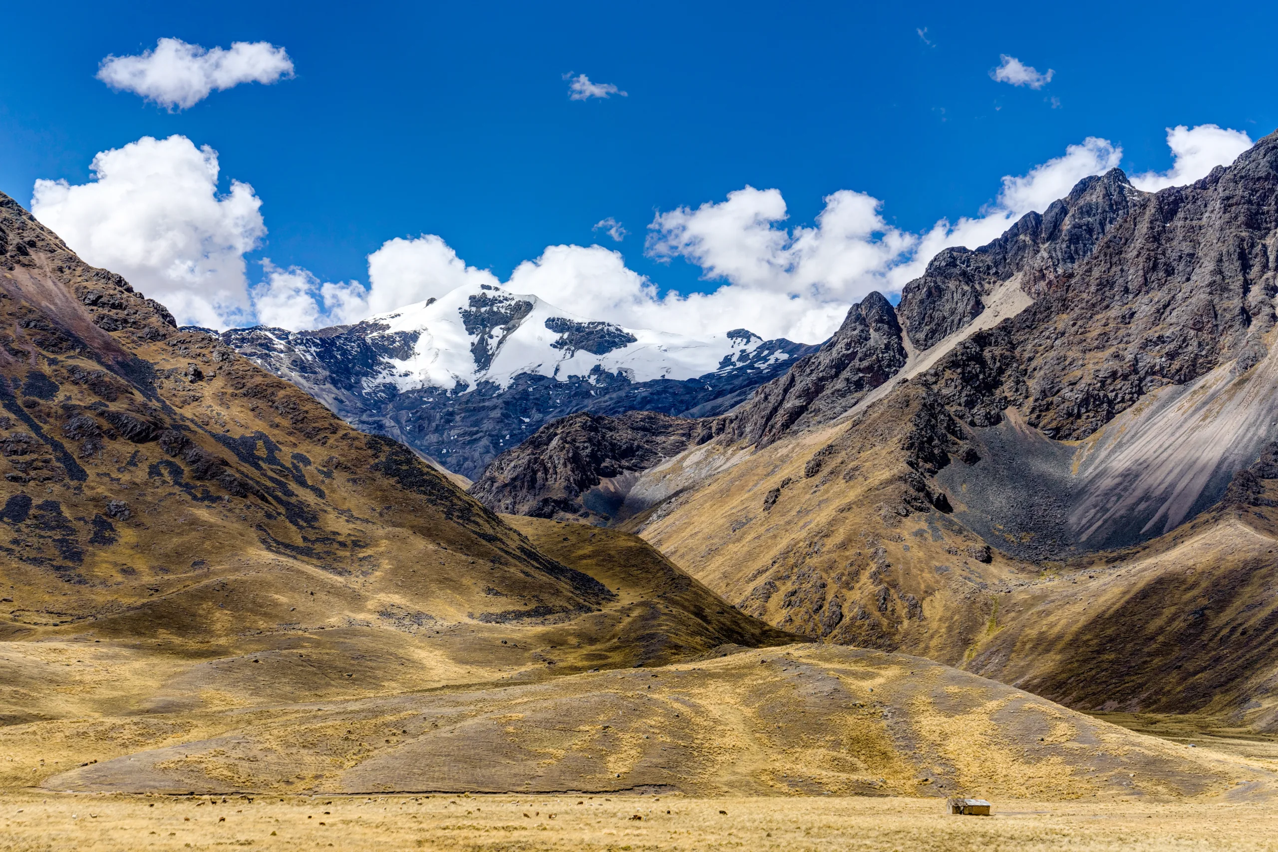 Peru Andes Mountain Scene Blue Sky And Clouds And Glacier